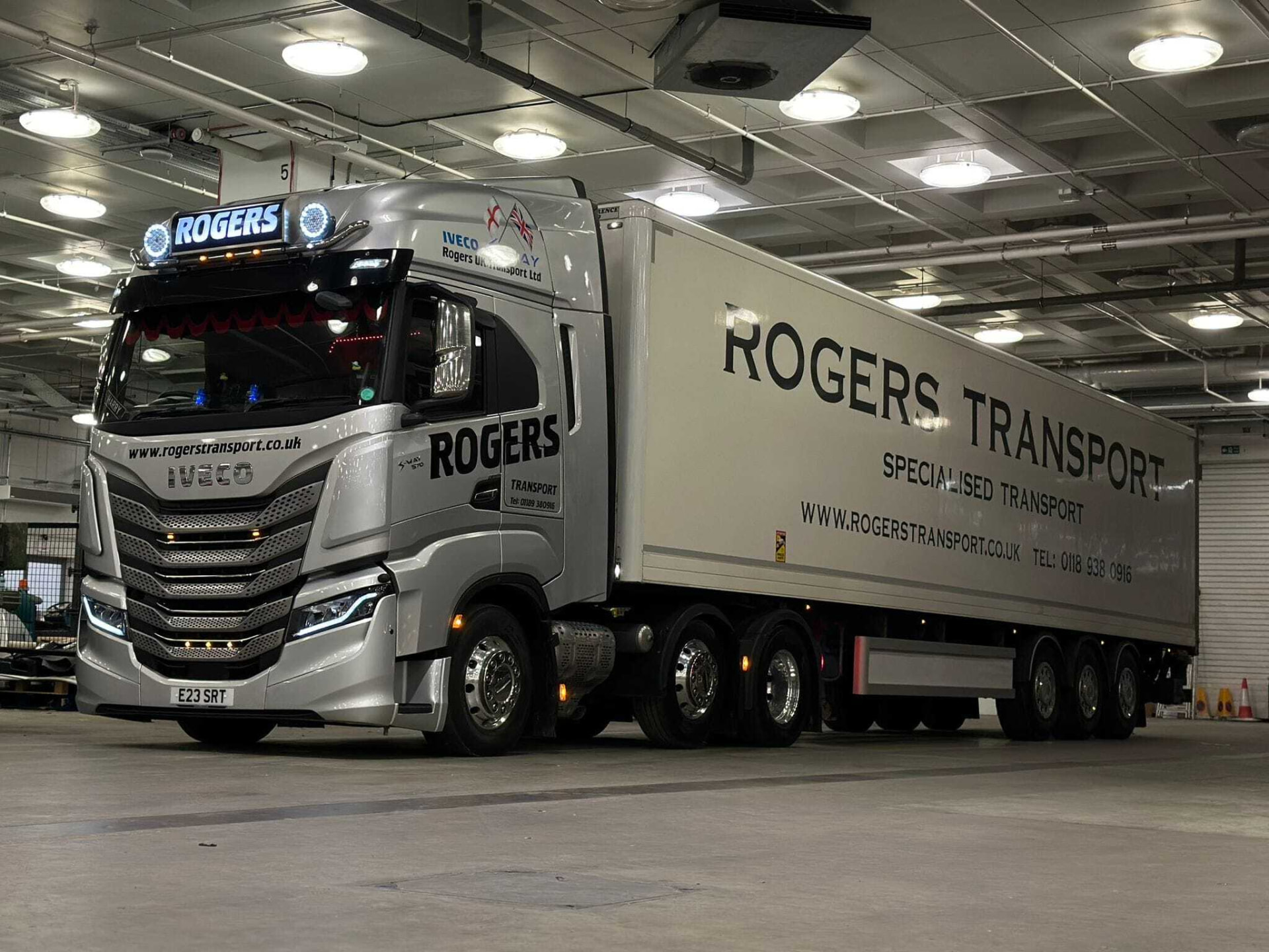 Silver IVECO S-Way unit with box trailer inside a depot