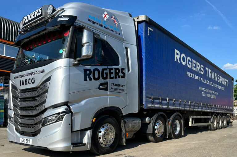 Silver IVECO with the Rogers Transport next day pallet delivery trailer