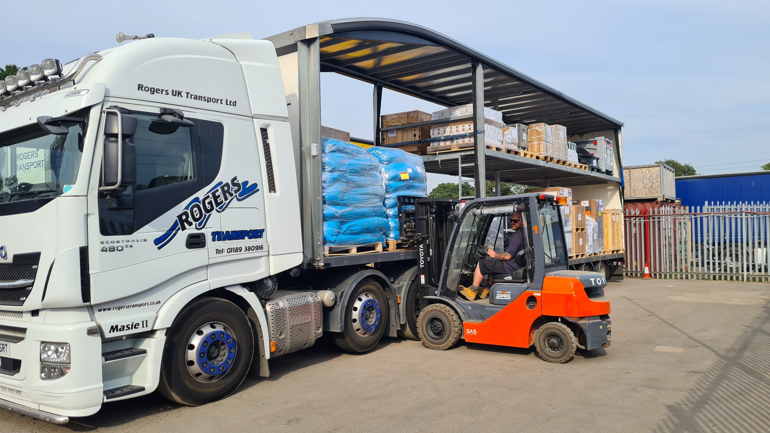 Pallets being loaded onto a Rogers Transport lorry